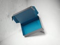 Blue opened package in concrete corner. 3d rendering