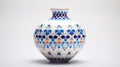 Blue And Orange Arabesque Vase On White Plate