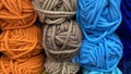 Blue, orange and brown range of wool yarn. Royalty Free Stock Photo