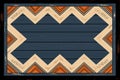 a blue and orange chevron pattern on a wooden background Royalty Free Stock Photo