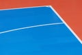 Blue and orange floor volleyball, basketball, badminton, futsal, handball court. Wooden floor of sports hall with marking lines li Royalty Free Stock Photo