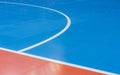 Blue and orange floor volleyball, basketball, badminton, futsal, handball court. Wooden floor of sports hall with marking lines li Royalty Free Stock Photo