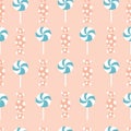 Blue an orange lolly pops and candies in a seamless pattern design