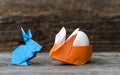 Blue and Orange Origami Rabbits with Egg Royalty Free Stock Photo