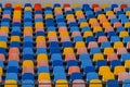 Blue and orange stadium plastic seats. Colorful texture Royalty Free Stock Photo