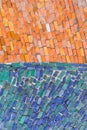 Blue and orange surface of abstract colorful smalt mosaic with high resolution for background