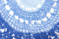 Blue ornate crochet napkin Royalty Free Stock Photo