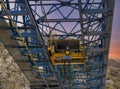 blue over head travelling crane in a marble factory Royalty Free Stock Photo