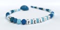 A blue pacifier chain for boys with name Felix Royalty Free Stock Photo