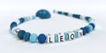 A blue pacifier chain for boys with name Leon