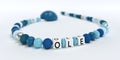 A blue pacifier chain for boys with name Ole