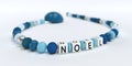 A blue pacifier chain for boys with name Noel Royalty Free Stock Photo