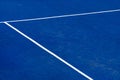 Blue paddle tennis court field with white lines background Royalty Free Stock Photo