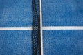 Blue paddle tennis net and court field background Royalty Free Stock Photo
