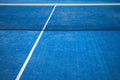 Blue paddle tennis net and court field background Royalty Free Stock Photo