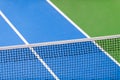 Blue paddle tennis net and hard court Royalty Free Stock Photo