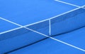 Blue paddle tennis net and hard court. Tennis compettion concept Royalty Free Stock Photo