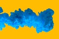 Blue paint clouds in water isolated on solid yellow background. Acrylic colors and ink in water. Abstract background. Isolated. Br Royalty Free Stock Photo