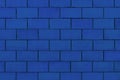 Blue paint on brick blocks urban design wall texture pattern background architecture stone abstract Royalty Free Stock Photo