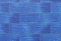 Blue paint on large brick blocks masonry wall texture background abstract pattern Royalty Free Stock Photo