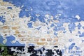 Blue paint peeling old brick wall background texture