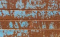 Blue paint rests on rusty structure Royalty Free Stock Photo
