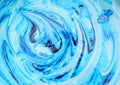 Blue paint with smooth spiral transitions in bright colors