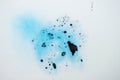 Blue paint splash grunge texture on white plastic. photo Royalty Free Stock Photo