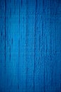 Blue paint on wood background