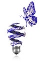 Blue painted butterfly fying around blue white light bulb