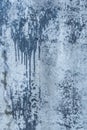 Blue painted concrete surface old stained paint wall texture spilled cement streaks background Royalty Free Stock Photo