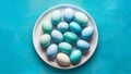 Blue painted eggs arranged on plate, top view Easter composition Royalty Free Stock Photo