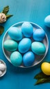 Blue painted eggs arranged on plate, top view Easter composition Royalty Free Stock Photo