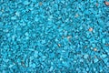 Blue painted gravel in a garden as background Royalty Free Stock Photo