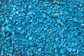 Blue painted gravel in a garden as background Royalty Free Stock Photo