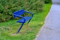 blue painted metal bench in public park Royalty Free Stock Photo