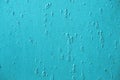 Blue painting on rusty metal surface Royalty Free Stock Photo