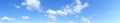 Blue panoramic sky with cumulus of white clouds, HD
