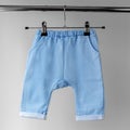 Blue panties for the baby. The concept of clothes, motherhood and newborn