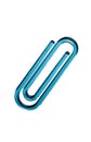 Blue paper clip against white background Royalty Free Stock Photo