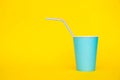 Blue Paper Cups With Drinking Colored Plastic Straws On Yellow Background. Set For Party. Minimalist Style. Copy, Empty Space For