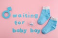 Blue letters, socks and pacifier Royalty Free Stock Photo