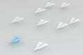 Blue paper plane white ones on white background, 3d rendering