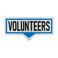 Blue paper speech banner with word volunteer on white background.