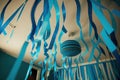 blue paper streamer hanging from ceiling at birthday party Royalty Free Stock Photo