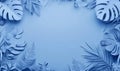 Blue Tropical Paper Flowers and Leaves Frame on Blue Background Royalty Free Stock Photo