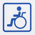 Blue parking sign for disabled or wheelchair isolated on white b