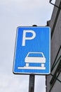 blue parking sign indicating parking on the sidewalk Royalty Free Stock Photo