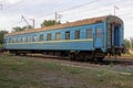 Blue passenger car on rails on the railway Royalty Free Stock Photo