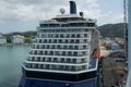 Blue passenger cruise ship Celebrity Silhouette moored from starboard side in cargo container terminal in port of Castries. Royalty Free Stock Photo